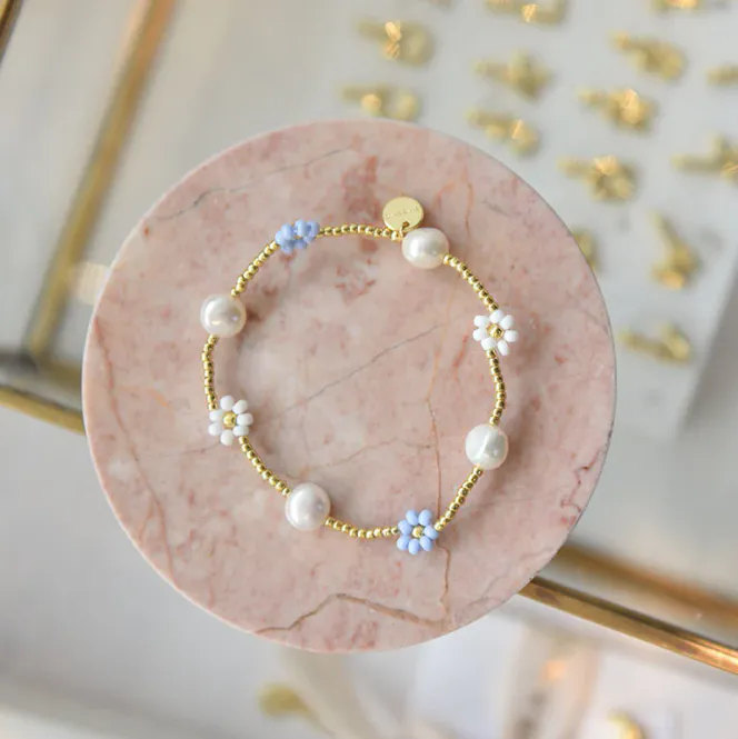 Hovedbilde Nelly blomsterarmbånd - lyseblå